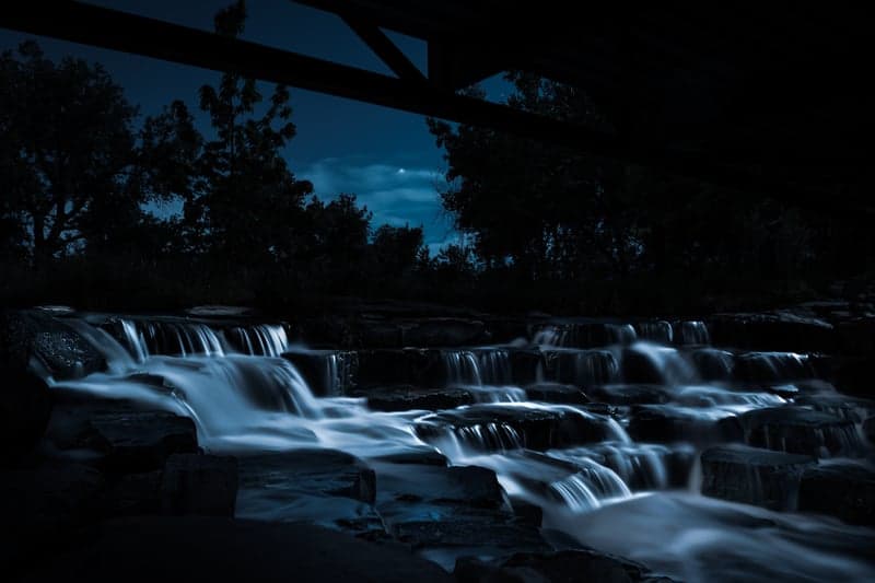 Early morning light breaking over mountain terrain
