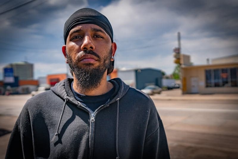 Snow-laden evergreen trees in a winter mountain setting