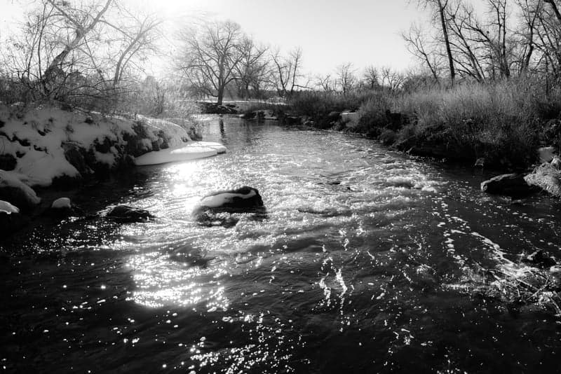 Fresh powder snow covering a mountain slope on a clear day
