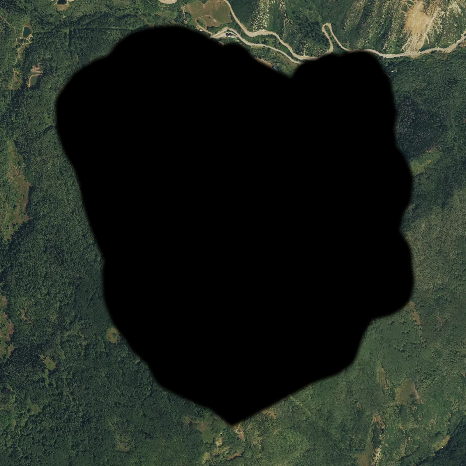 USDA NAIP orthoimagery for the Sunlight Mountain bake; the white region is the resort mask the pipeline carves.