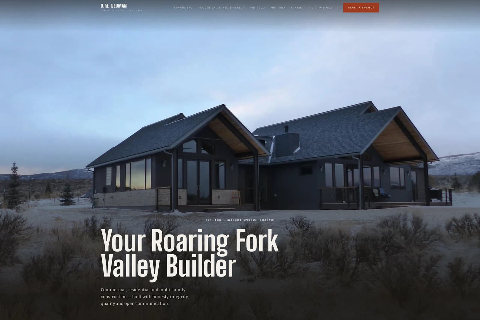 D.M. Neuman rebuild — a dark custom home at dusk under "Your Roaring Fork Valley Builder" in condensed capitals, EST. 1982 · GLENWOOD SPRINGS, COLORADO on the dimension line.